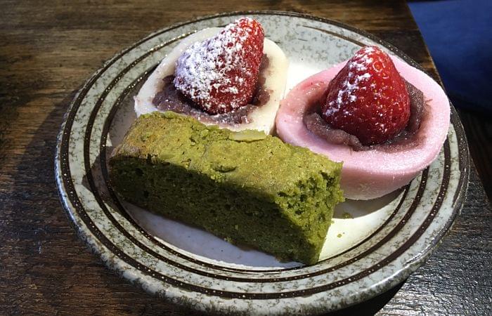 Some Japanese cakes on a plate