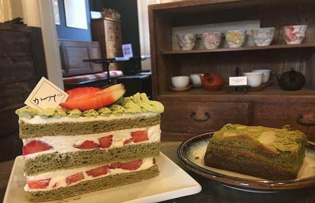 Strawberry Shortcake & Matcha Brownie on display in a cafe