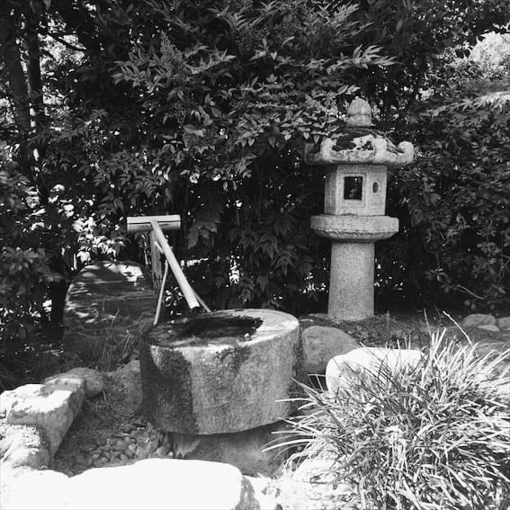 A stone lantern in a garden