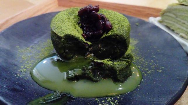 A green matcha fondant on a plate