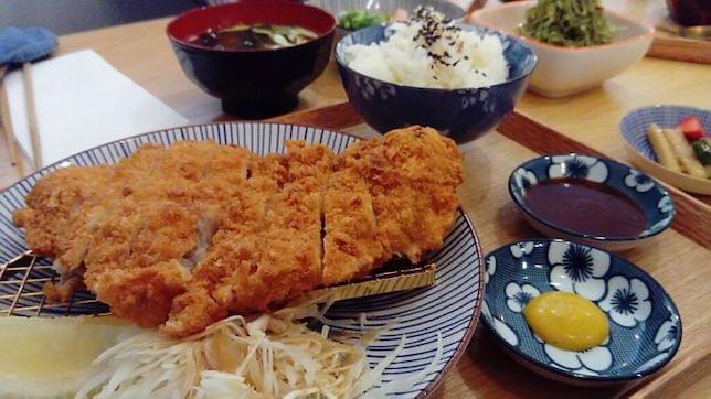 Some Japanese food on a restaurant table