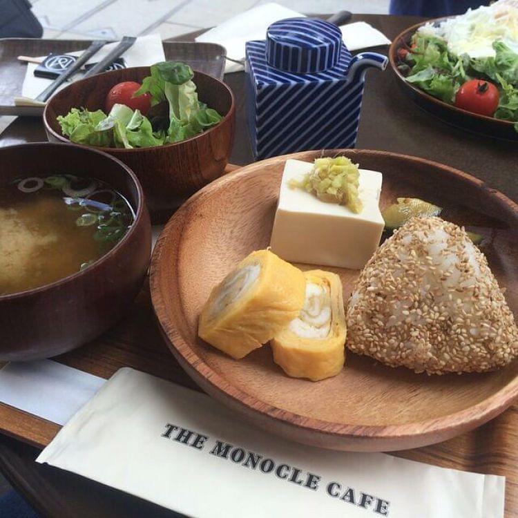 Some Japanese food dishes on a table in a restaurant