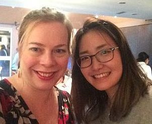 Two women friends smiling