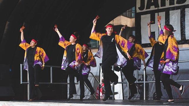 Some Japanese dancers performing on stage