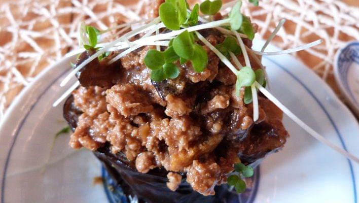 Roasted Aubergine with Chicken Hatcho Miso Sauce on a plate