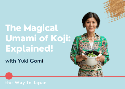 A Japanese woman holding a bowl of salad